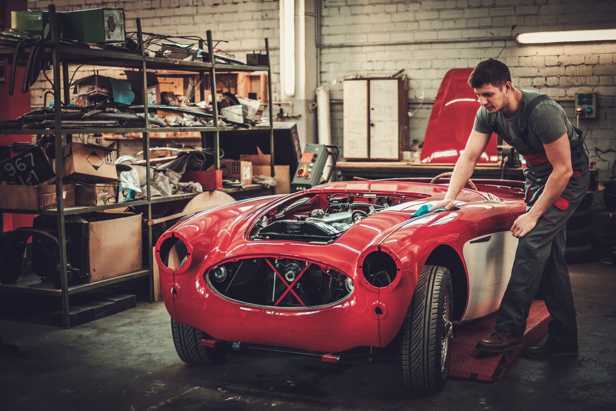 a man waxing a car